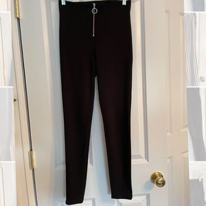 Boutique black stretchy pants with o-ring zipper on the front